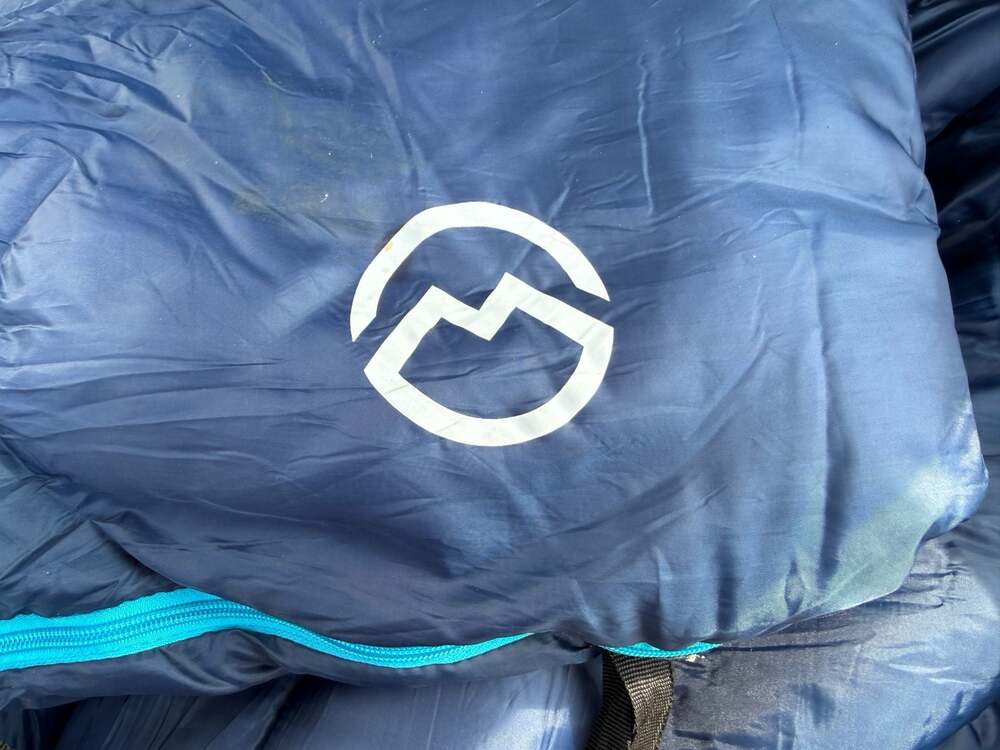 Magellan Outdoors Blue Mummy Sleeping Bag with Bright Blue Zipper